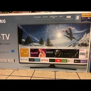 Brand new black Samsung flat screen tv